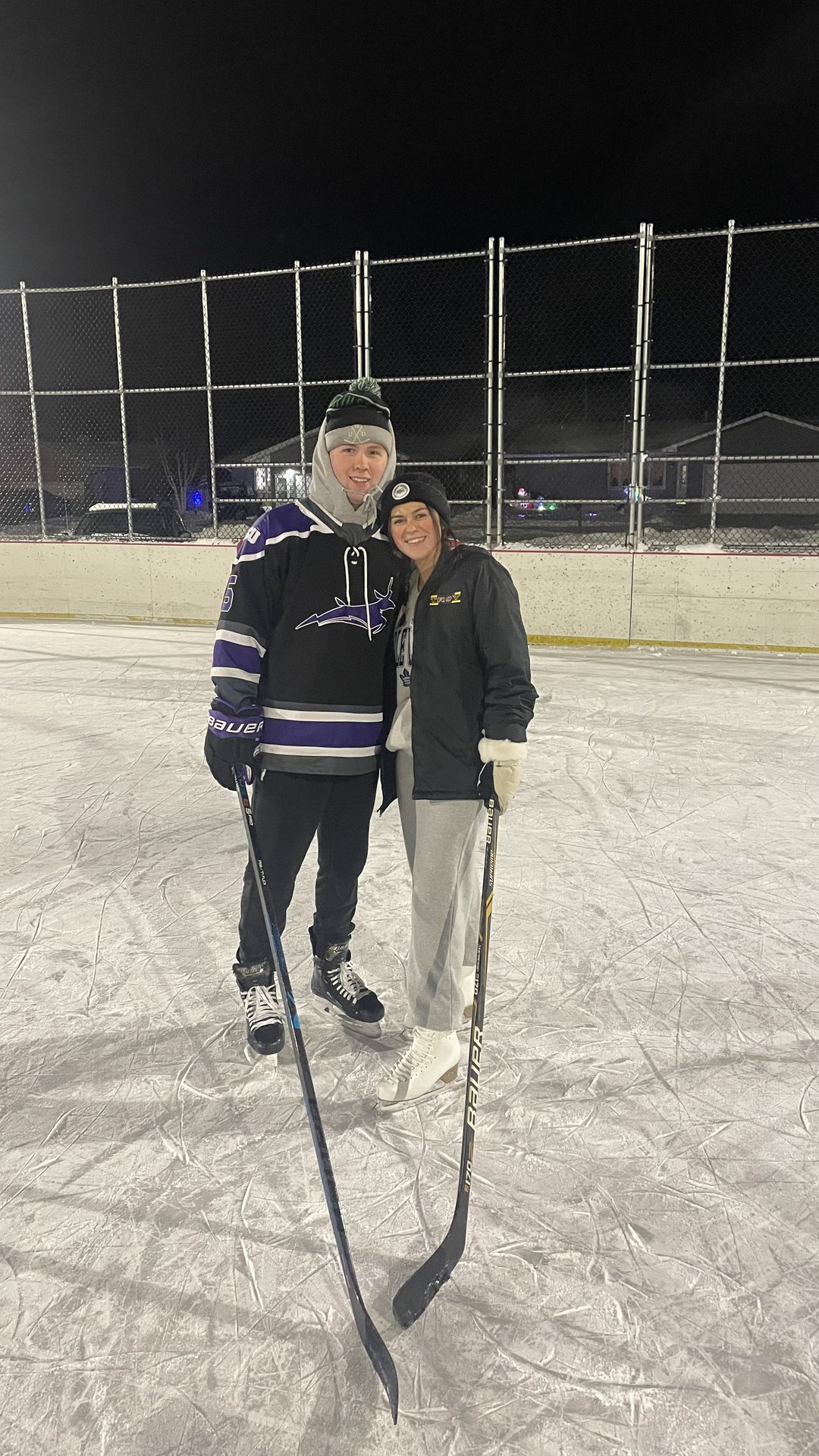 Derwin Hauser and Emily on the outdoor rink